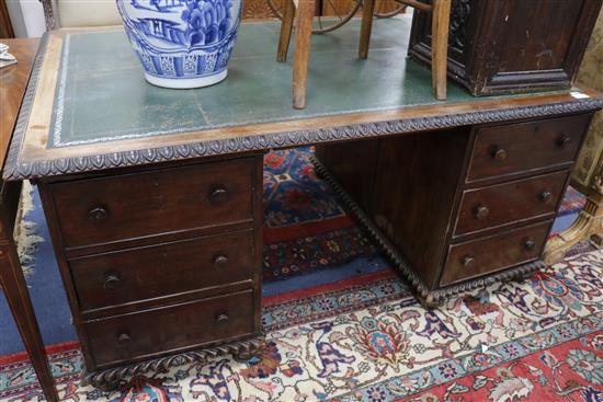 An Anglo Indian padouk pedestal desk 5ft 3in x 3ft 8in.